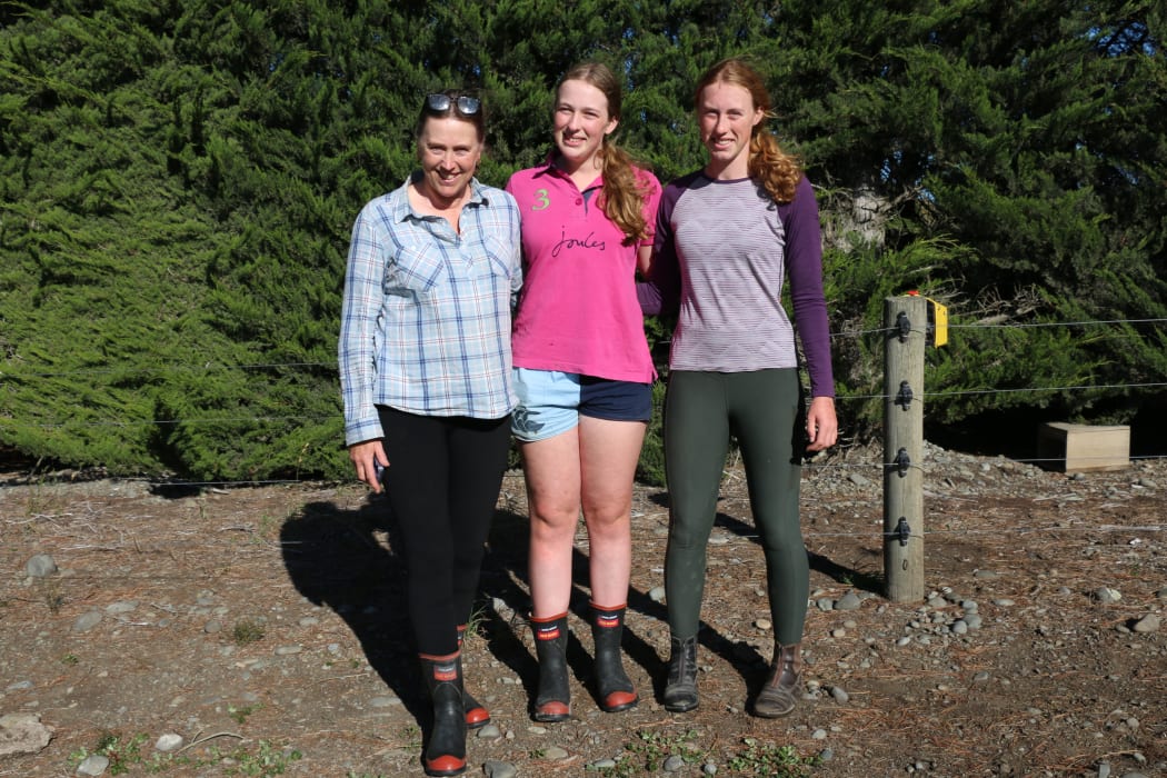 Sarah Rickard (left) and daughters Rachel (15) and Kate (17) trek around the farm clearing possum and mustelid traps.