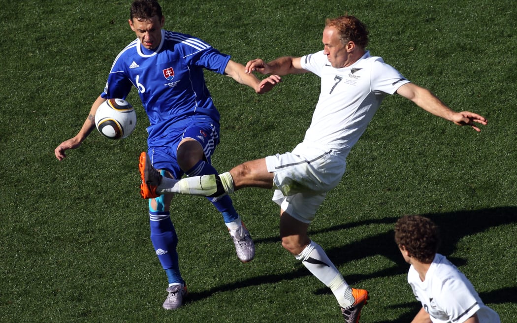 Slovakia's Zdenko Strba and Simon Elliott during All Whites versus Slovakia at Football World Cup South Africa.