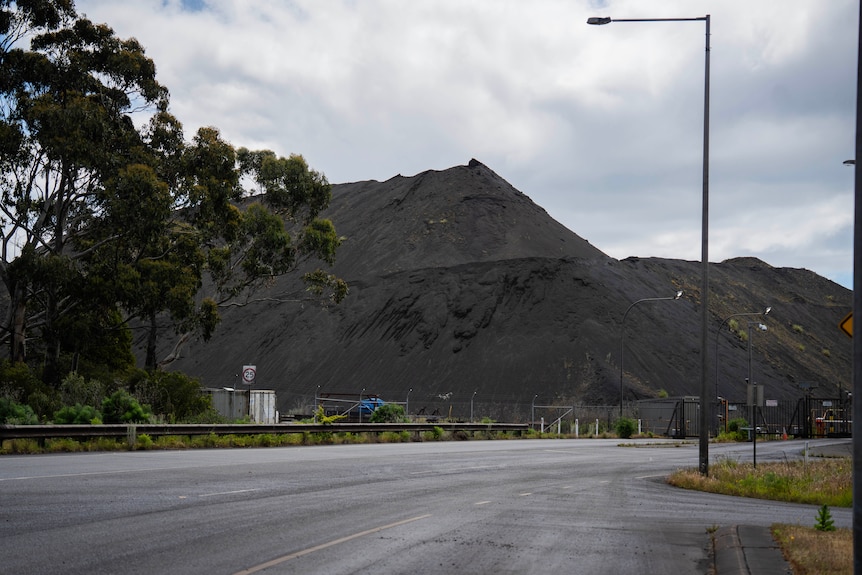 A large pile of ore at a smelter site.