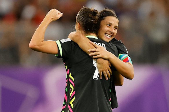 Sam Kerr and Caitlin Foord celebrate the win.