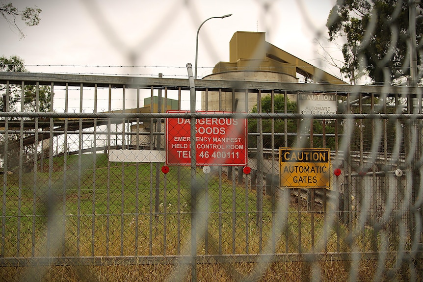 Mine viewed through a fence.