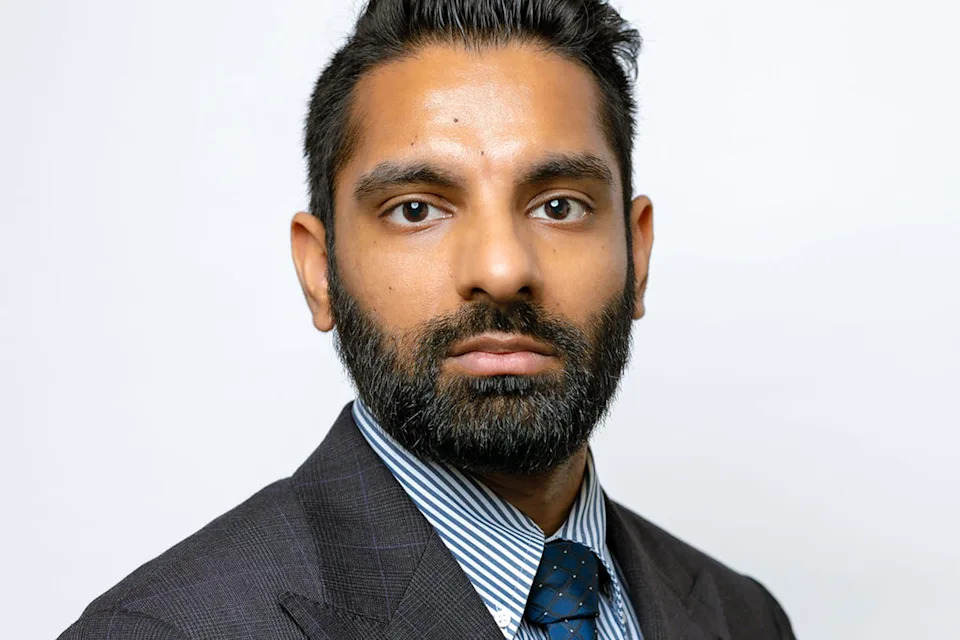 A head and shoulders photo of Sydney lawyer Avinash Singh. 