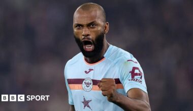 Igor Thiago celebrates with a clenched left fist and passionate facial expression