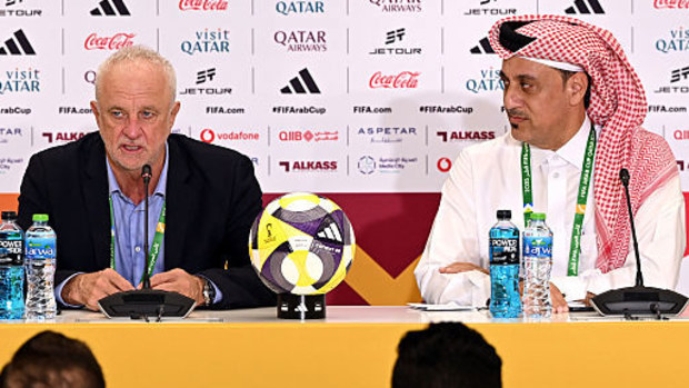 Graham Arnold and Mohanad Ali of Iraq speak to the media in a post match press conference.