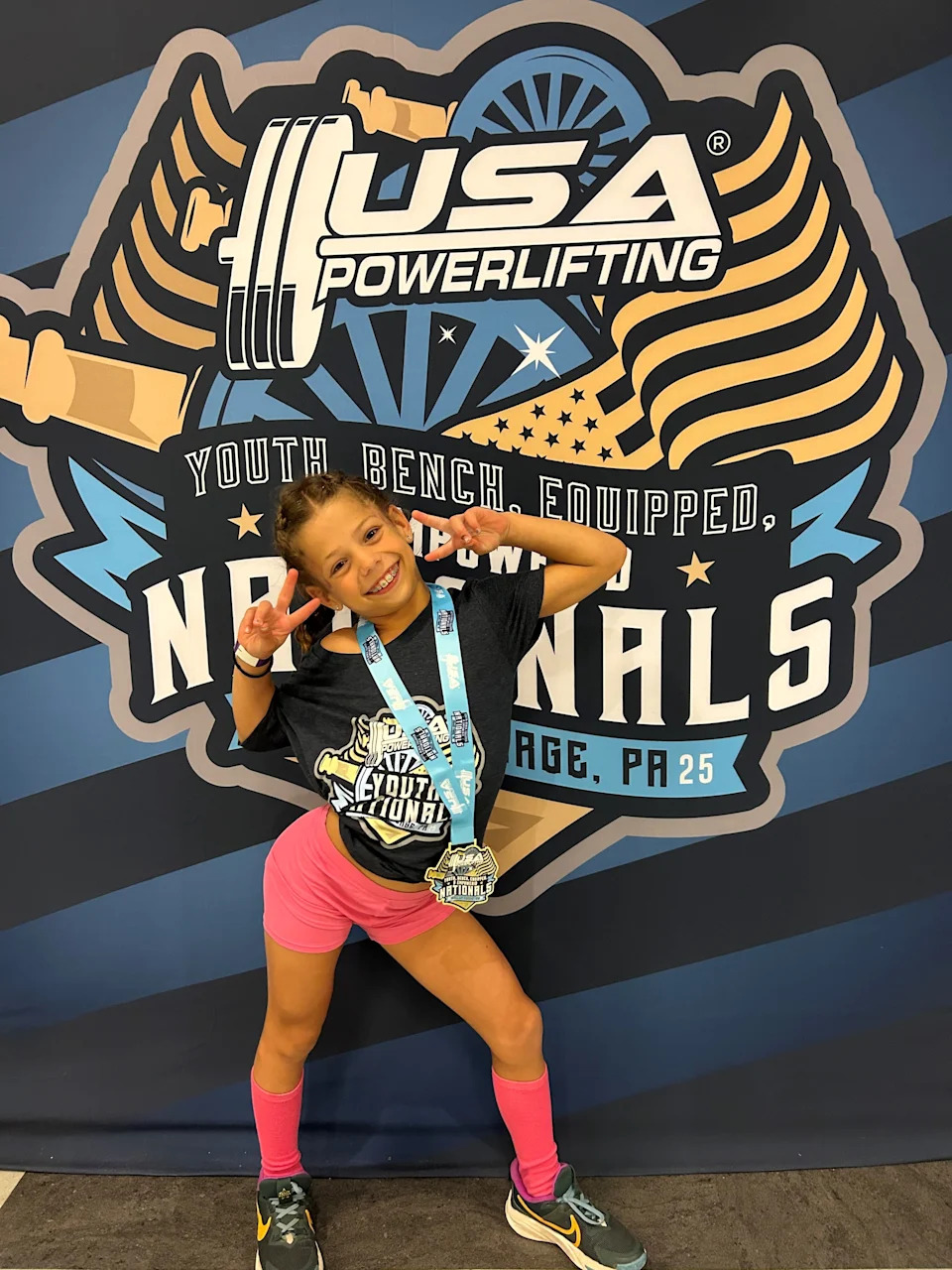 Lucy Milgrim poses for a photo at the USA Powerlifting Arnold Sports Festival in Columbus, Ohio in 2025.