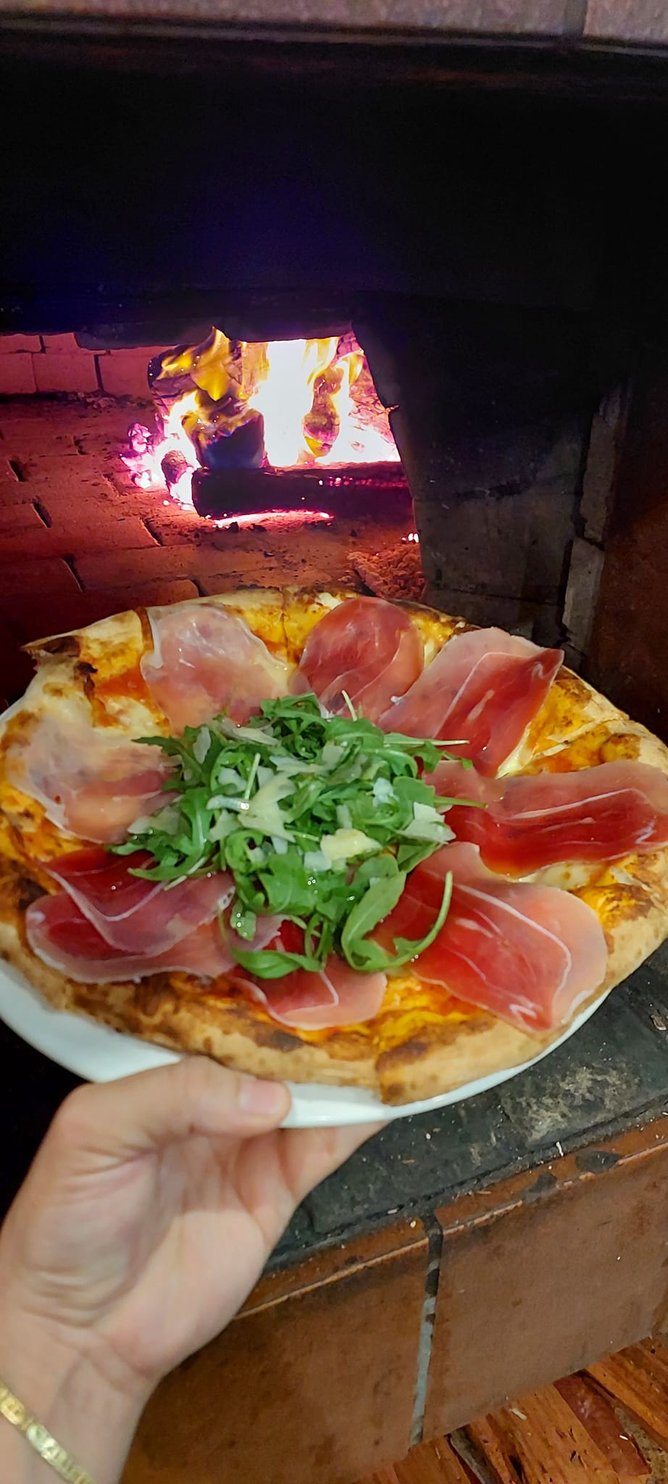 The restaurant was well known for its delicious woodfired pizzas.