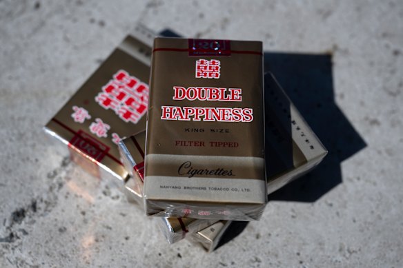 Illicit Double Happiness cigarettes, which are sold for as low as $13 in stores.