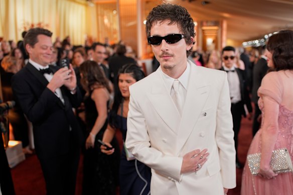 Timothee Chalamet arrives at the Oscars on Sunday in Los Angeles.