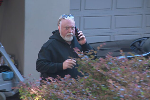 Kyle Sandilands, pictured at home last week, has hired a crack legal team.