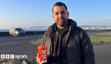 Mental health support information leaflets from Mind and a red memory cup in honour of the men who died.