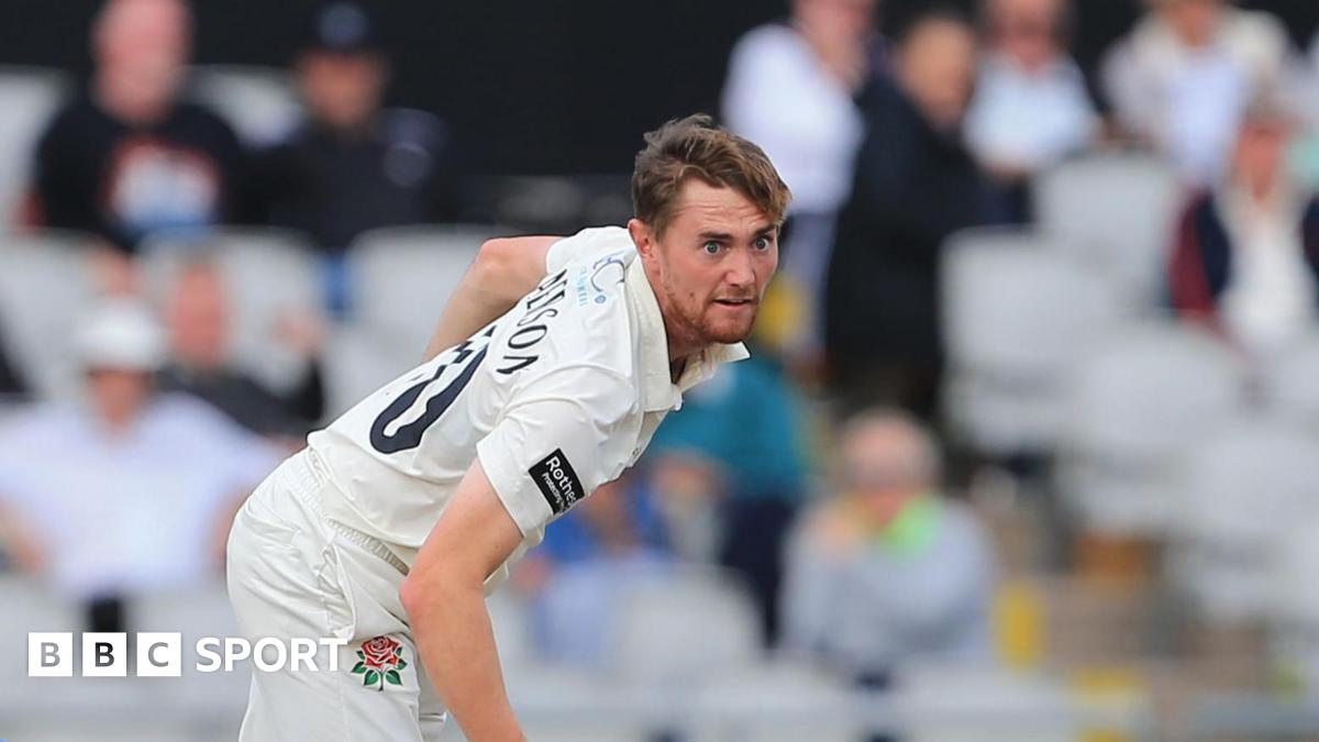 George Balderson, in whites wearing number 10 'BALDERSON', bowling for Lancashire at Old Trafford