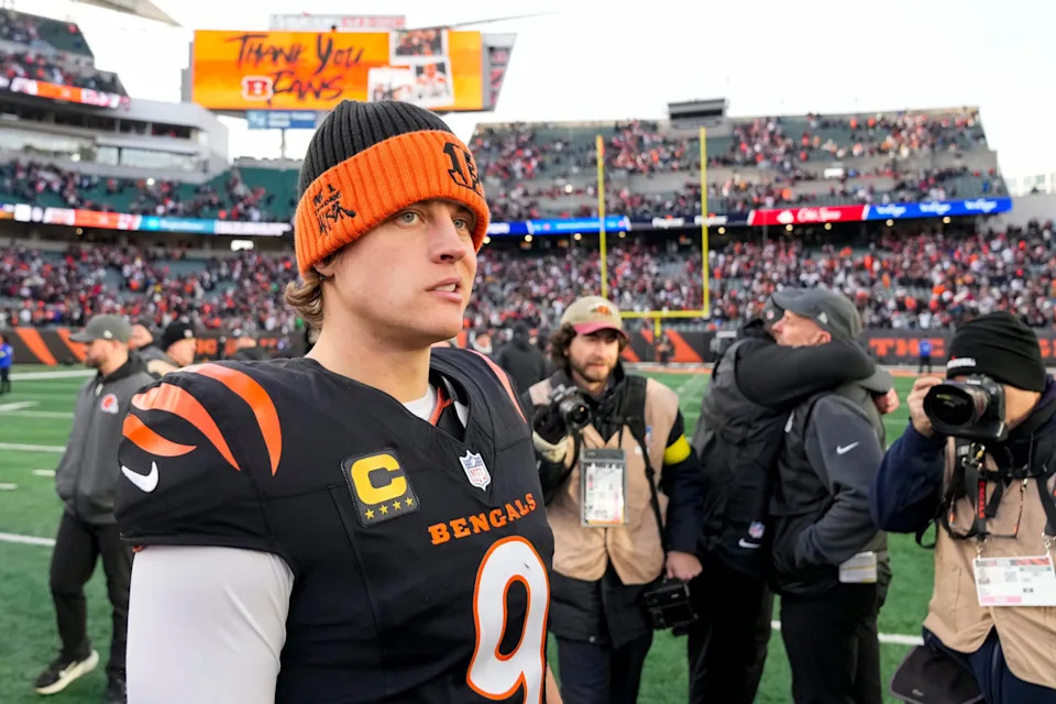 <p>Cincinnati Bengals star Joe Burrow looks for hands to shake after an NFL game against the Cleveland Browns.</p>