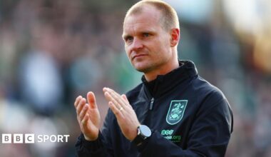 Huddersfield Town boss Liam Manning claps the club's fans after a 3-1 defeat at Plymouth in League One