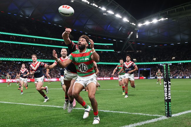 SYDNEY, AUSTRALIA - SEPTEMBER 05: Alex Johnston of the Rabbitohs and Mark Nawaqanitawase of the Roosters compete for the ball during the round 27 NRL match between the Sydney Roosters and South Sydney Rabbitohs at Allianz Stadium on September 05, 2025, in Sydney, Australia. (Photo by Cameron Spencer/Getty Images)