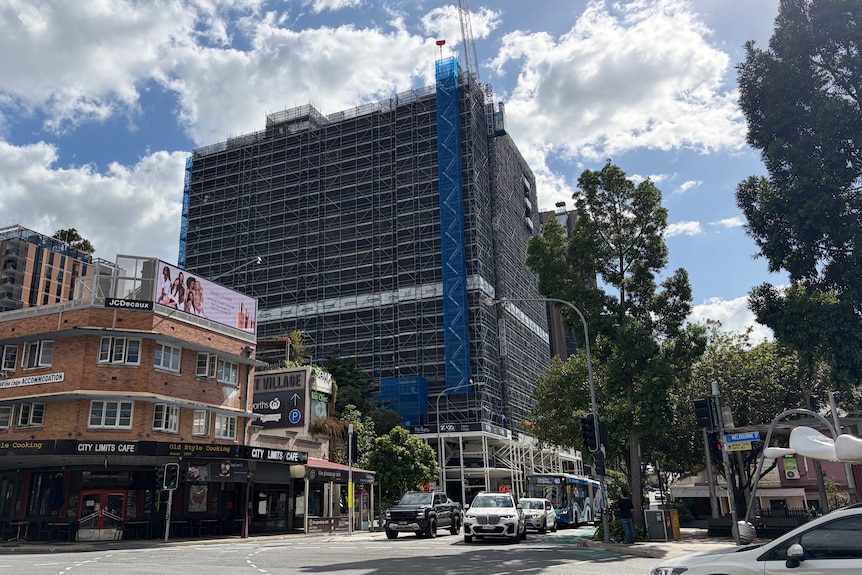 A construction site of a high rise apartment building. 