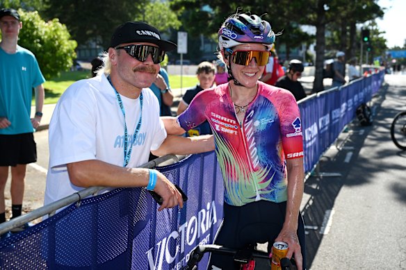 Formula 1 racing driver Valtteri Bottas supporting partner Tiffany Cromwell at a cycling event. 