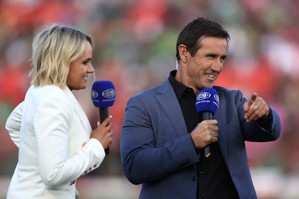 Pictured left to right, Channel Nine star Emma Lawrence and NRL legend Andrew Johns.