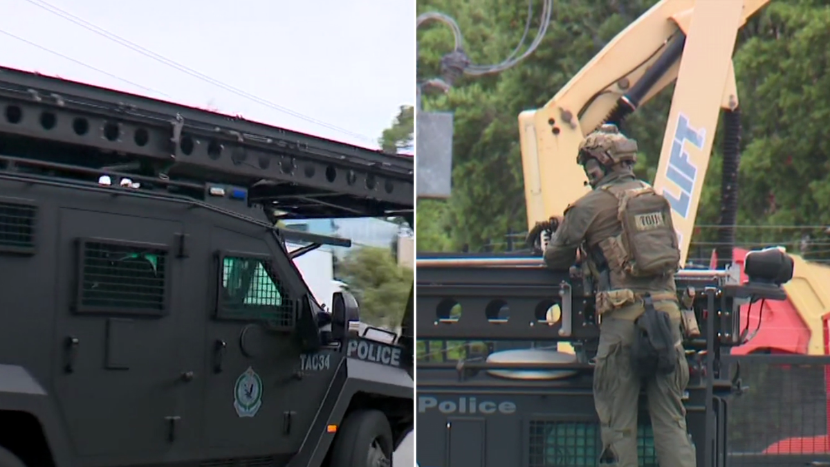 Man arrested after stand-off with suspected gunman at western Sydney brothel