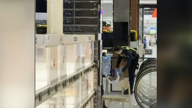 Police at the shopping centre on Thursday. 