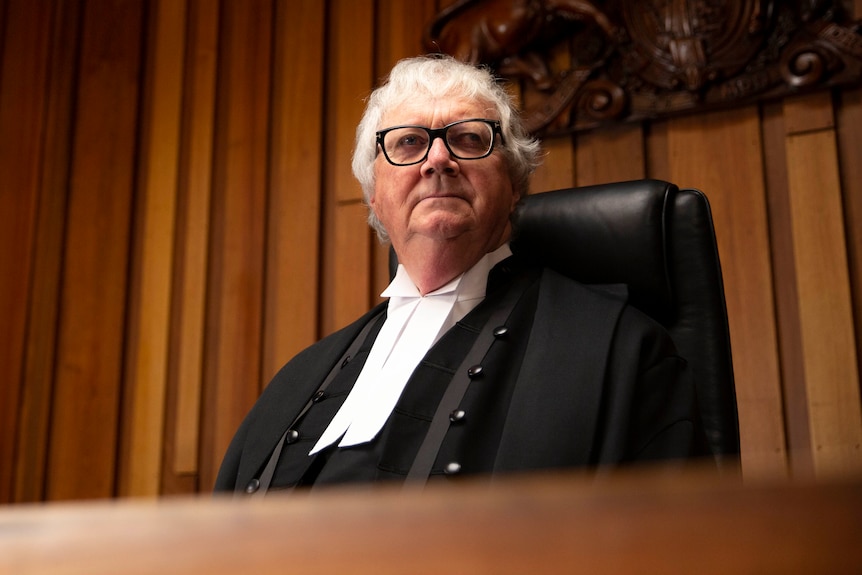 A judge in a courtroom.