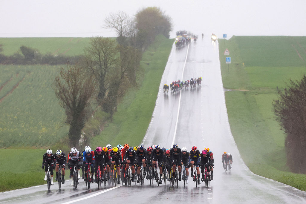A group of riders cycle in a breakaway during the 4th stage of the Paris-Nice cycling race, 195 km between Bourges and Uchon, on March 11, 2026. (Photo by Anne-Christine POUJOULAT / AFP)