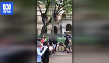 Protesters arrested for using phrases banned under new Queensland hate speech laws