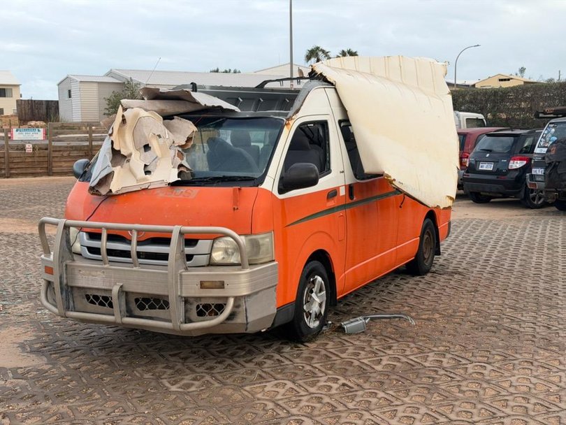 A roughed up camper van in Coral Bay. 
