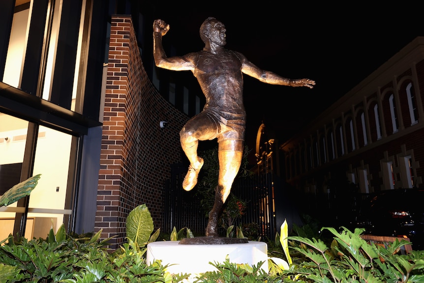 A bronze statue depicting Adam Goodes's famous war dance pose.