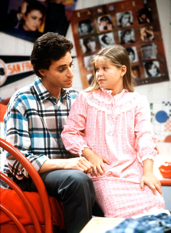Bure with her co-star Bob Saget during a Season 1 episode of “Full House” in 1987.