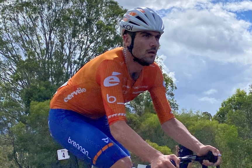 Conor Leahy rides his bike