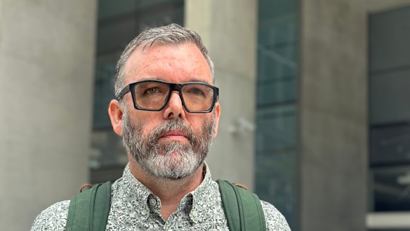 Daniel Angus, the director of QUT’s Digital Media Research Centre, spoke outside the District Court in Brisbane.
