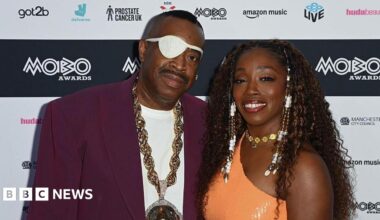 Slick Rick performs with Estelle after winning lifetime achievement at Mobos