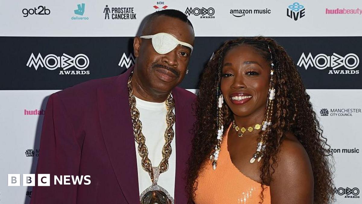 Slick Rick performs with Estelle after winning lifetime achievement at Mobos