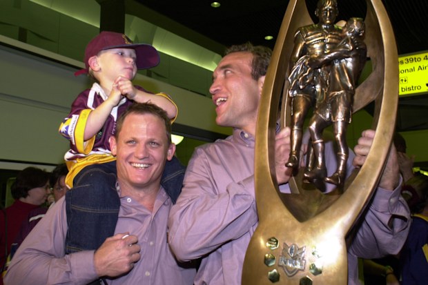 Kevin Walters and Gorden Tallis of the Brisbane Broncos celebrate winning the 2000 NRL grand final against the Sydney Roosters with Broncos fans at Brisbane Airport in Brisbane, Australia.  DIGITAL IMAGE.  Mandatory Credit: Darren England/ALLSPORT