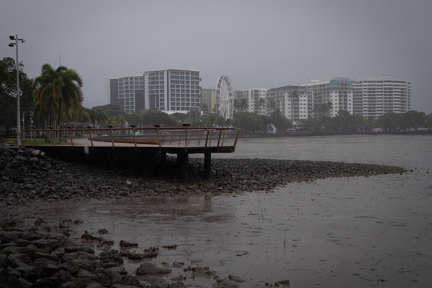 A dark and gloomy sky over buildings in Cairns CBD