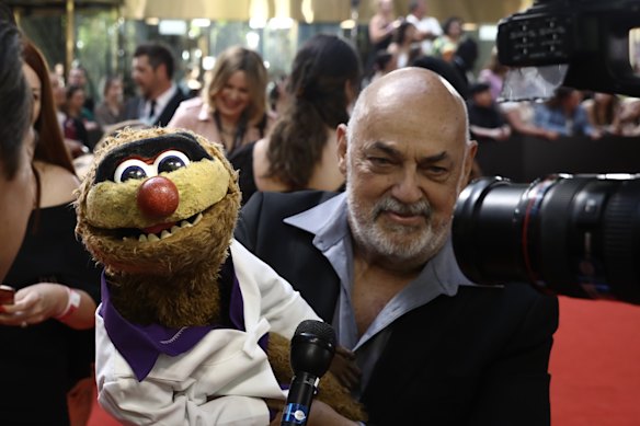 Jamie Dunn and puppet Agro at the ARIA Awards in 2019.