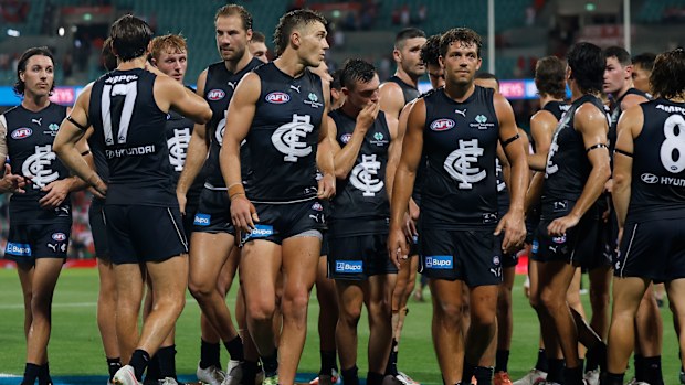 Patrick Cripps leads Carlton off the field.