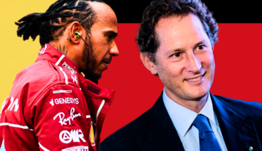 Lewis Hamilton looks far from impressed at Ferrari chairman John Elkann