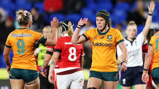 Layne Morgan and Emily Chancellor of Australia celebrate.