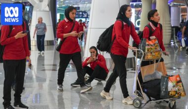Iranian women's football team begin journey home after five withdraw asylum claims in Australia