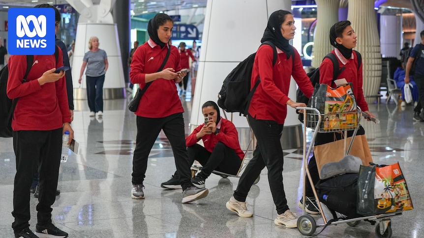 Iranian women's football team begin journey home after five withdraw asylum claims in Australia