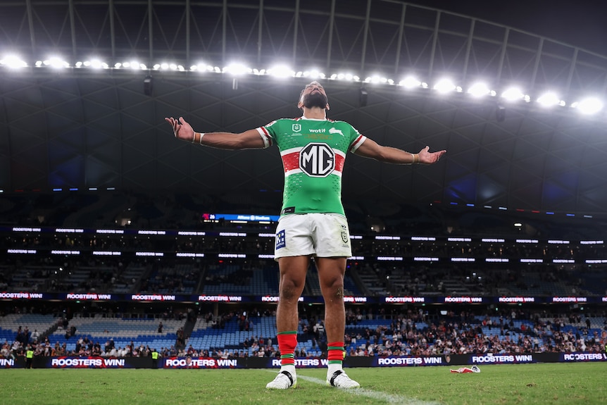 Alex Johnston celebrates after breaking the NRL try-scoring record