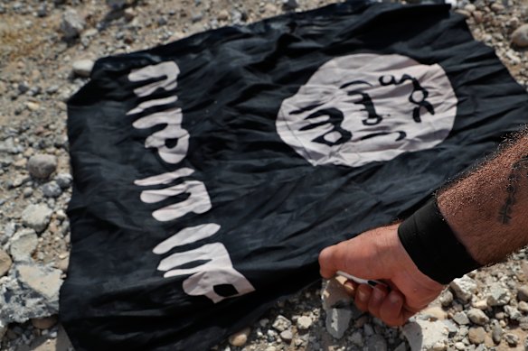 A file image of an Islamic State flag in Syria. 