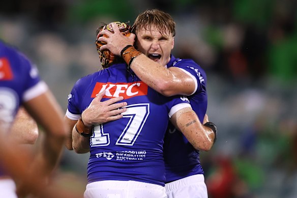 Jacob Preston (right) and Josh Curran celebrate a try.