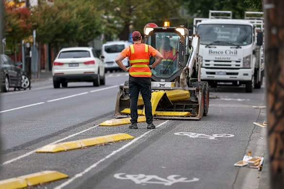 The bikelane infrastructure being ripped up on Monday morning.