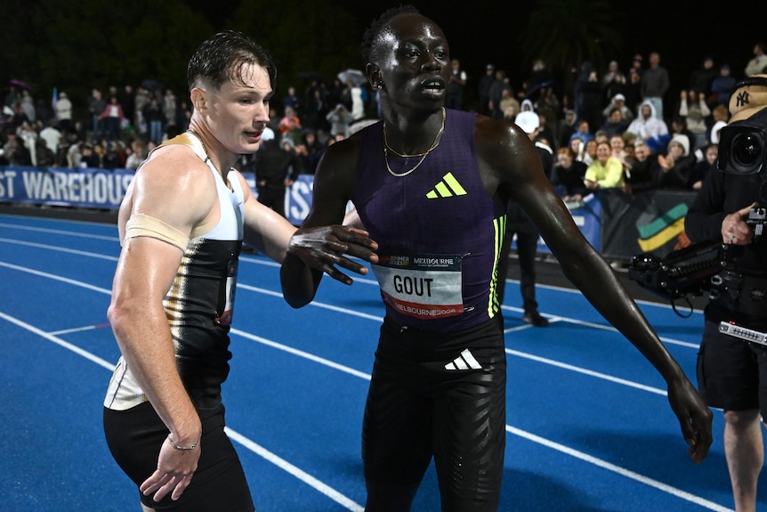Lachlan Kennedy is congratulated by Gout Gout at the 2026 Maurie Plant Meet.