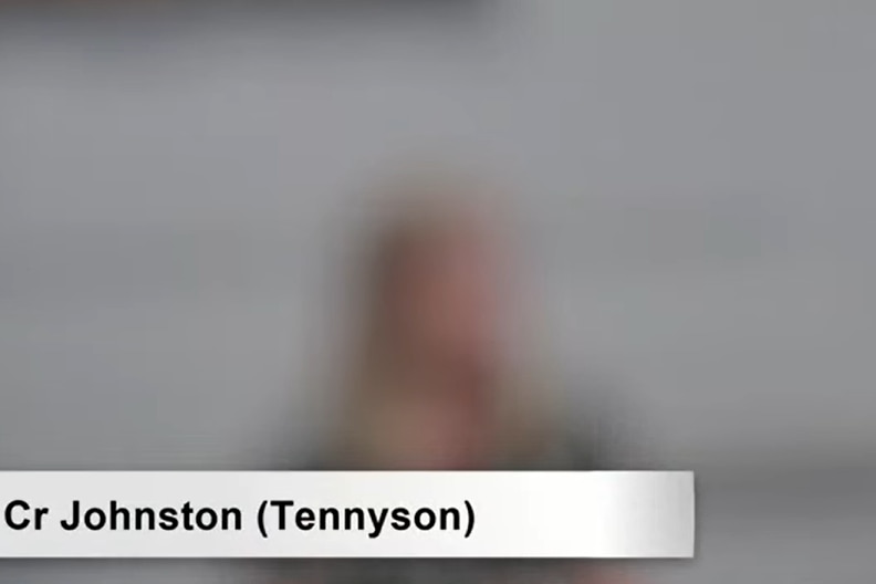 A blurry photo taken from a webcam in a virtual meeting