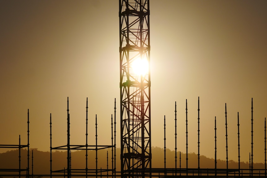 building construction site at sunset