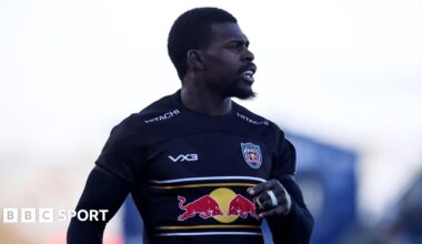 Christian Wade standing on the pitch during a match for Newcastle