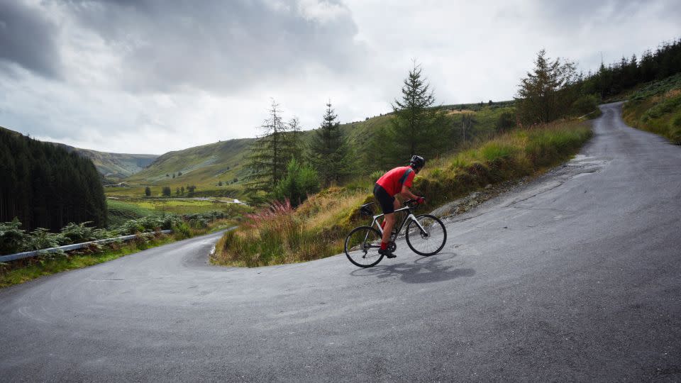 Regularly engaging in varied forms of movement may boost longevity, a new study found. Bicycling can be a fun addition to your routine. - James Osmond/The Image Bank RF/Getty Images